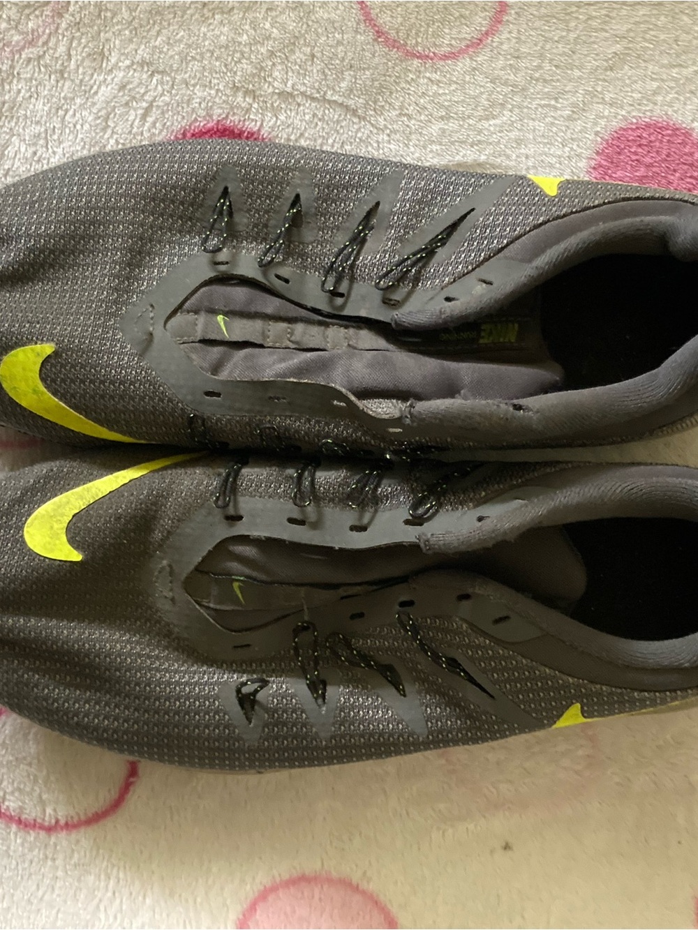 Nike Gray Sneakers with Yellow Swoosh